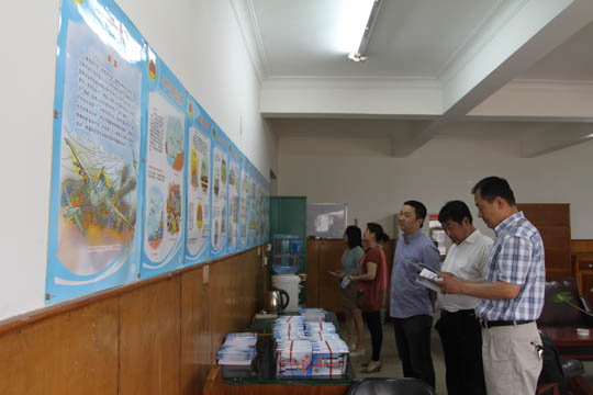 演练前乐鱼官方在线入口机关及各单位员工学习防空、防灾知识